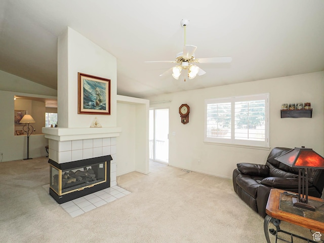 3988 W Sugar Beet Dr S, West Valley City, UT 84120 - living room with carpet flooring, a ceiling fan, a tiled fireplace, and lofted ceiling