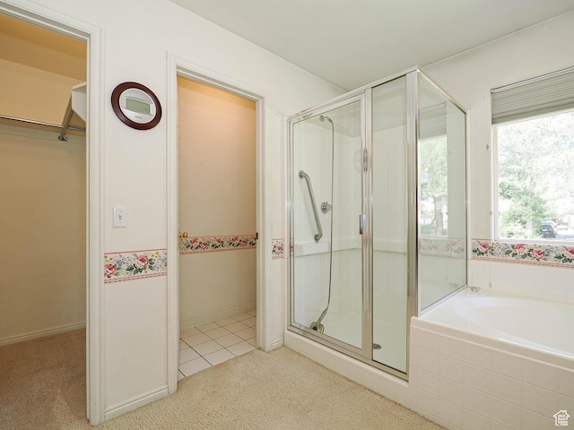 3988 W Sugar Beet Dr S, West Valley City, UT 84120 - bathroom featuring a shower stall, a bath, tile patterned floors, and carpet flooring
