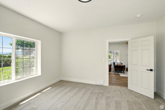 1655 W 2200 S, College Ward, UT 84339 - unfurnished room featuring carpet and an office area
