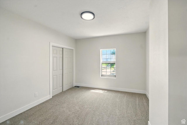 1655 W 2200 S, College Ward, UT 84339 - unfurnished bedroom with carpet flooring and a closet