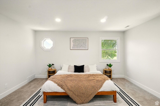 1655 W 2200 S, College Ward, UT 84339 - bedroom featuring multiple windows, light colored carpet, and recessed lighting