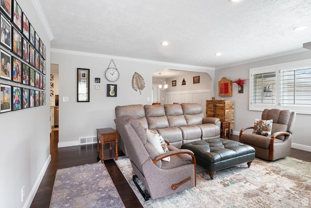 149 E 800 N, Bountiful, UT 84010 - living room with a textured ceiling, wood finished floors, ornamental molding, a chandelier, and recessed lighting