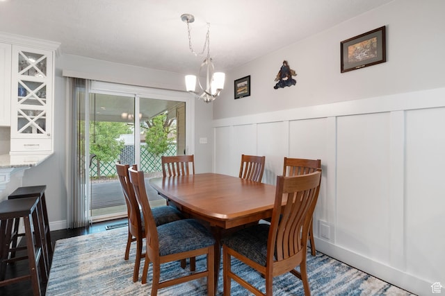 149 E 800 N, Bountiful, UT 84010 - dining area with a chandelier, wainscoting, and a decorative wall
