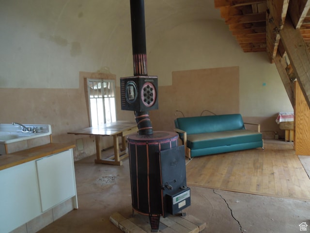 313 W Holyoak Ln, Castle Valley, UT 84532 - interior space featuring a wood stove and a sink