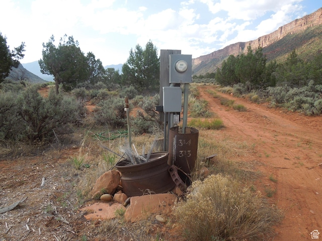 313 W Holyoak Ln, Castle Valley, UT 84532 - exterior view of a mountainous background and electric meter