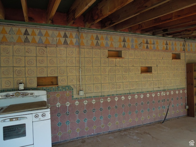 313 W Holyoak Ln, Castle Valley, UT 84532 - miscellaneous room featuring unfinished concrete floors