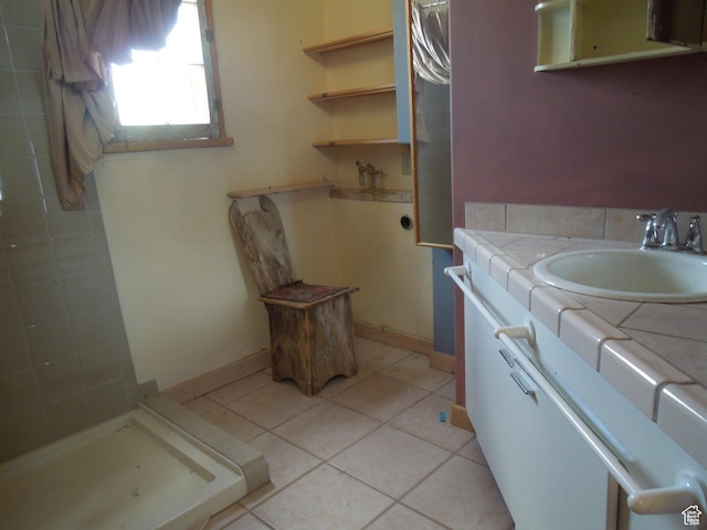 313 W Holyoak Ln, Castle Valley, UT 84532 - bathroom featuring vanity, a stall shower, and tile patterned floors