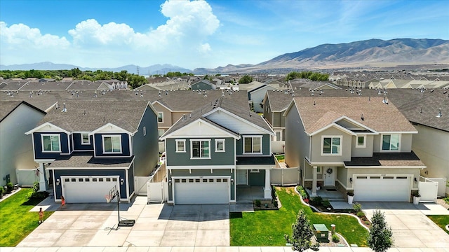 1147 E Fathom Ln, Saratoga Springs, UT 84045 - traditional-style house with a residential view, a garage, and driveway