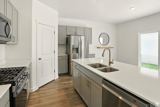 1147 E Fathom Ln, Saratoga Springs, UT 84045 - kitchen featuring gray cabinetry, stainless steel appliances, dark wood-type flooring, light countertops, and recessed lighting