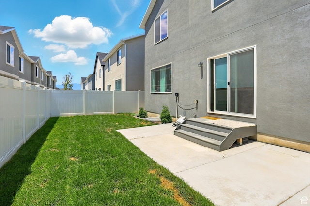 1147 E Fathom Ln, Saratoga Springs, UT 84045 - fenced backyard featuring a patio area and a residential view