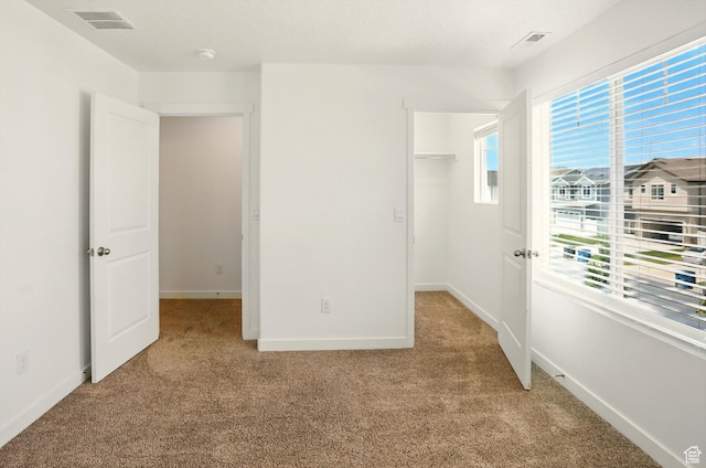 1147 E Fathom Ln, Saratoga Springs, UT 84045 - unfurnished bedroom featuring light colored carpet and a spacious closet