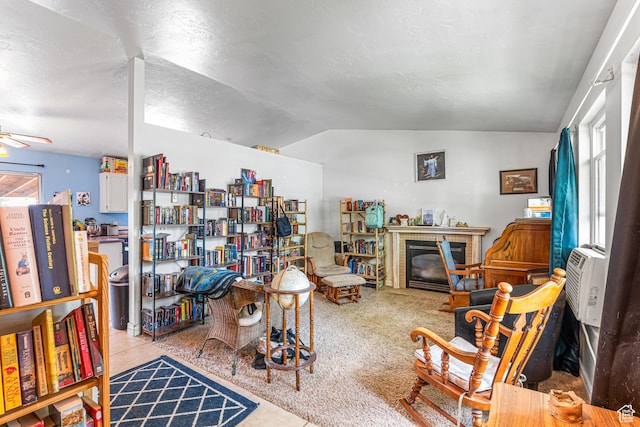 462 E 370 N, Delta, UT 84624 - living room with lofted ceiling, a brick fireplace, a ceiling fan, and a textured ceiling