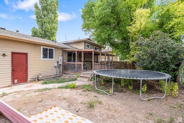 462 E 370 N, Delta, UT 84624 - view of yard featuring a trampoline and a wooden deck