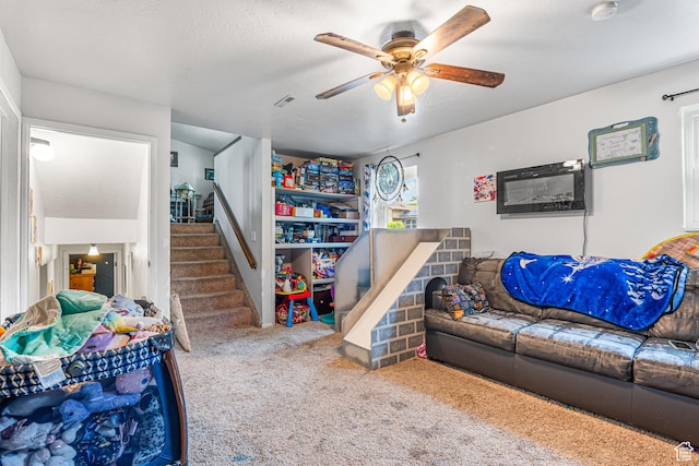 462 E 370 N, Delta, UT 84624 - living area featuring ceiling fan, carpet, and stairway
