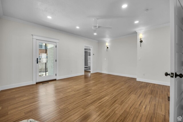 2546 S Fowler, Ogden, UT 84401 - empty room featuring ceiling fan, ornamental molding, wood finished floors, recessed lighting, and a smoke detector