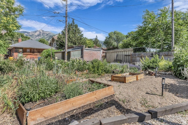 2546 S Fowler, Ogden, UT 84401 - view of yard featuring a garden and a mountain view