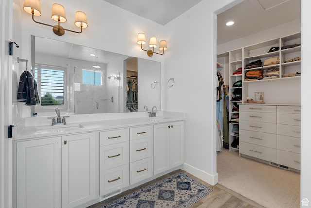 1872 S 250 W, Lehi, UT 84043 - full bath with a walk in closet, a stall shower, double vanity, and wood finished floors