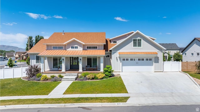 1872 S 250 W, Lehi, UT 84043 - modern farmhouse with board and batten siding, a standing seam roof, covered porch, driveway, and a metal roof
