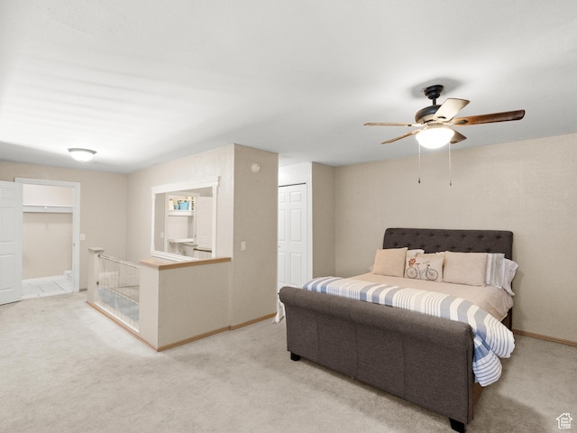5320 S 570 E Unit L, Salt Lake City, UT 84107 - bedroom with light carpet, ceiling fan, and a closet