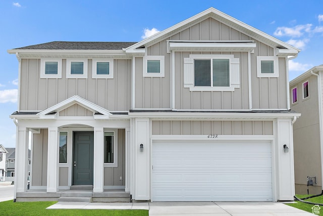 4728 E Lake Corner Dr, Eagle Mountain, UT 84005 - view of front of home featuring an attached garage, concrete driveway, board and batten siding, and roof with shingles