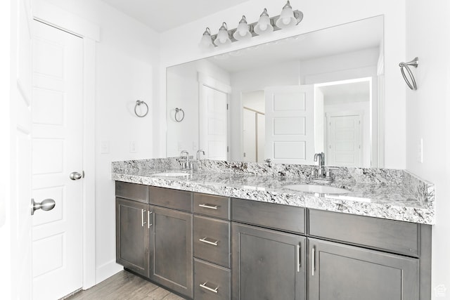 4728 E Lake Corner Dr, Eagle Mountain, UT 84005 - full bath featuring double vanity, wood finished floors, and a shower