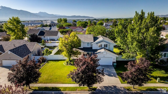 4689 W Nebo Dr S, West Jordan, UT 84088 - aerial view of residential area with a mountainous background