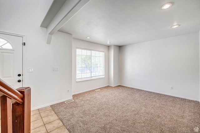 4689 W Nebo Dr S, West Jordan, UT 84088 - foyer with recessed lighting, light colored carpet, and light tile patterned floors
