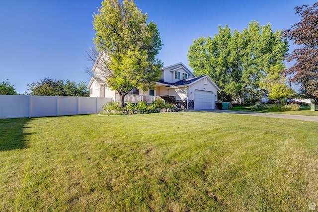 4689 W Nebo Dr S, West Jordan, UT 84088 - obstructed view of property with asphalt driveway, stucco siding, a garage, and a porch