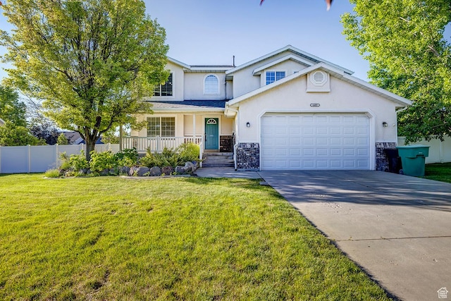 4689 W Nebo Dr S, West Jordan, UT 84088 - traditional-style home with stucco siding, stone siding, driveway, a garage, and a porch