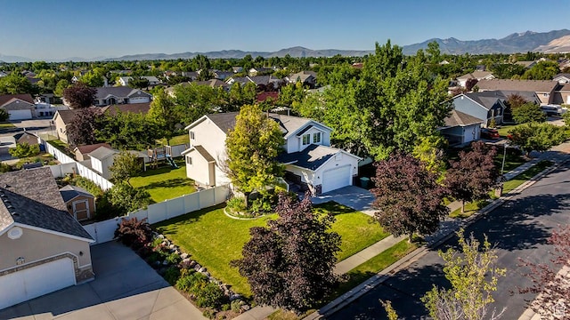 4689 W Nebo Dr S, West Jordan, UT 84088 - aerial view of residential area featuring a mountain backdrop