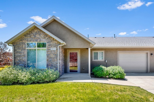 9213 S 2040 W Unit C, West Jordan, UT 84088 - view of front of house featuring stone siding, stucco siding, an attached garage, and a front lawn