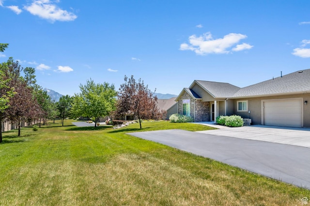 9213 S 2040 W Unit C, West Jordan, UT 84088 - view of green lawn featuring a garage and driveway