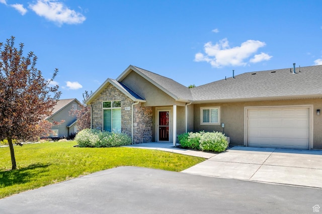 9213 S 2040 W Unit C, West Jordan, UT 84088 - view of front of property featuring a garage, stucco siding, a front lawn, and concrete driveway