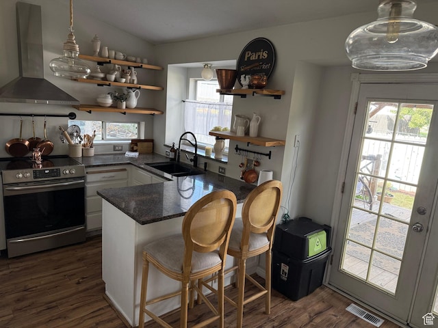 334 W 100 N, Clearfield, UT 84015 - kitchen with wall chimney exhaust hood, stainless steel electric stove, open shelves, a peninsula, and dark wood-type flooring