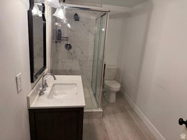 334 W 100 N, Clearfield, UT 84015 - bathroom with vanity, a marble finish shower, and wood finished floors