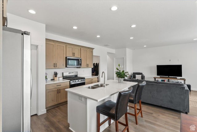 4113 S 3560 W, West Haven, UT 84401 - kitchen with stainless steel appliances, dark wood-style flooring, light countertops, open floor plan, and recessed lighting