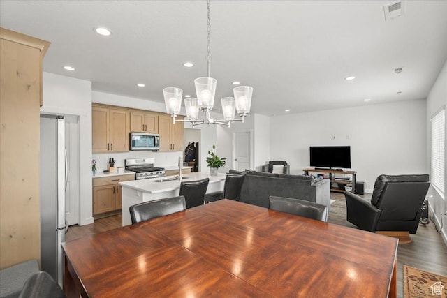 4113 S 3560 W, West Haven, UT 84401 - dining room featuring dark wood-style floors, a chandelier, and recessed lighting