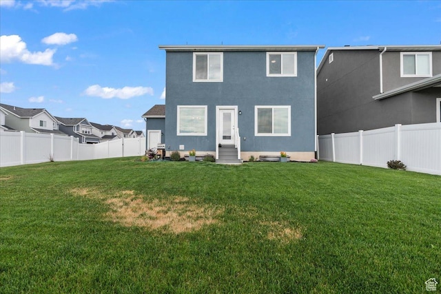 4113 S 3560 W, West Haven, UT 84401 - rear view of property featuring a fenced backyard and stucco siding