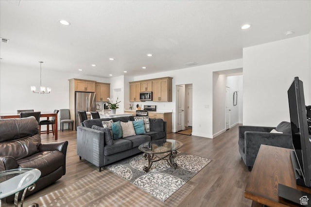 4113 S 3560 W, West Haven, UT 84401 - living room featuring a chandelier, dark wood-type flooring, and recessed lighting