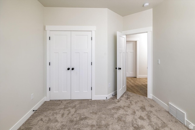 156 N Sherwood Dr, Providence, UT 84332 - unfurnished bedroom with carpet and a closet