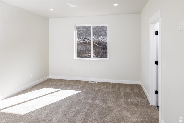 156 N Sherwood Dr, Providence, UT 84332 - carpeted empty room featuring baseboards and recessed lighting