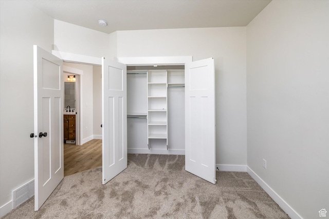 156 N Sherwood Dr, Providence, UT 84332 - unfurnished bedroom with carpet and a closet