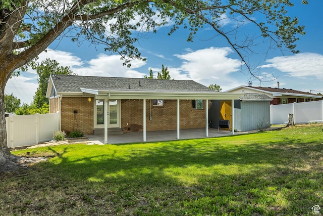 470 Hiland Rd, Ogden, UT 84404 - rear view of house featuring brick siding, a patio area, french doors, a gate, and a shingled roof
