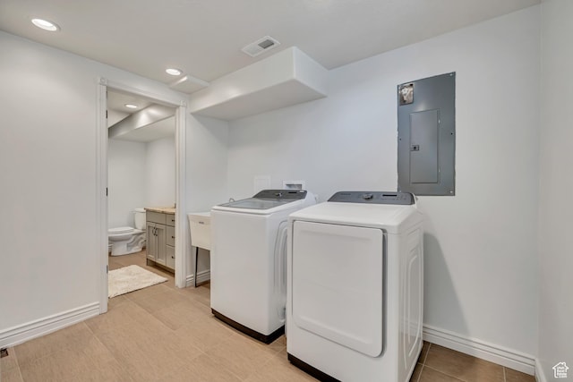 470 Hiland Rd, Ogden, UT 84404 - washroom with electric panel, independent washer and dryer, and recessed lighting