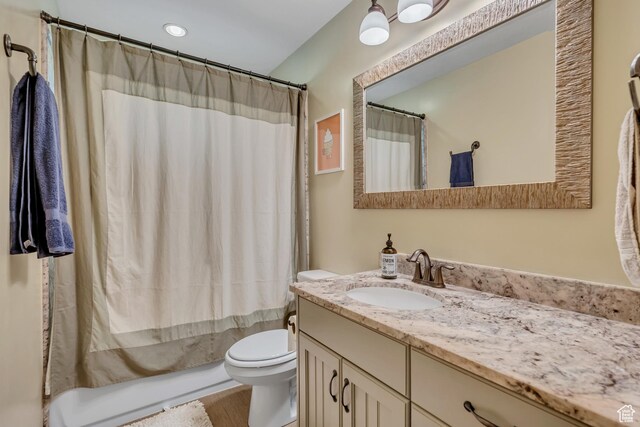 470 Hiland Rd, Ogden, UT 84404 - full bath featuring vanity, wood finished floors, recessed lighting, and shower / bath combination with curtain
