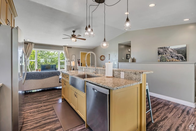 470 Hiland Rd, Ogden, UT 84404 - kitchen featuring appliances with stainless steel finishes, open floor plan, dark wood finished floors, lofted ceiling, and cream cabinets