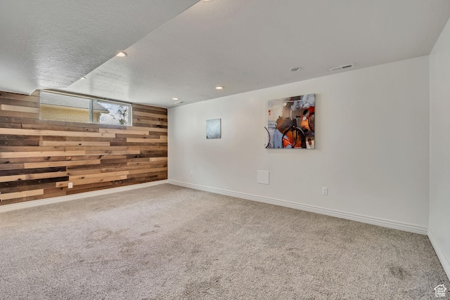 470 Hiland Rd, Ogden, UT 84404 - empty room featuring wooden walls, carpet floors, and recessed lighting
