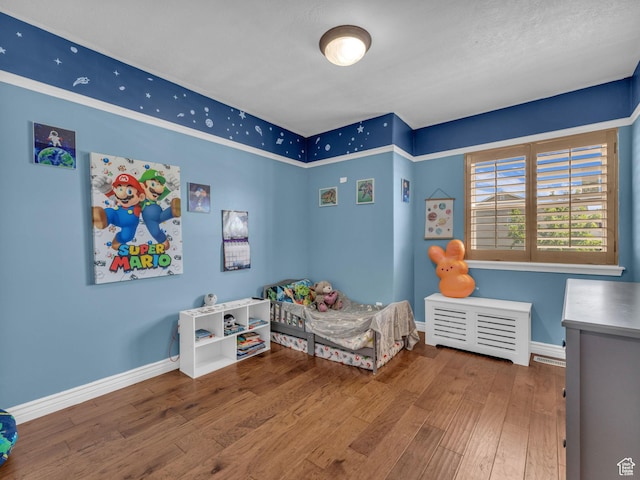 6238 W 8235 S, West Jordan, UT 84084 - bedroom with hardwood / wood-style floors and baseboards