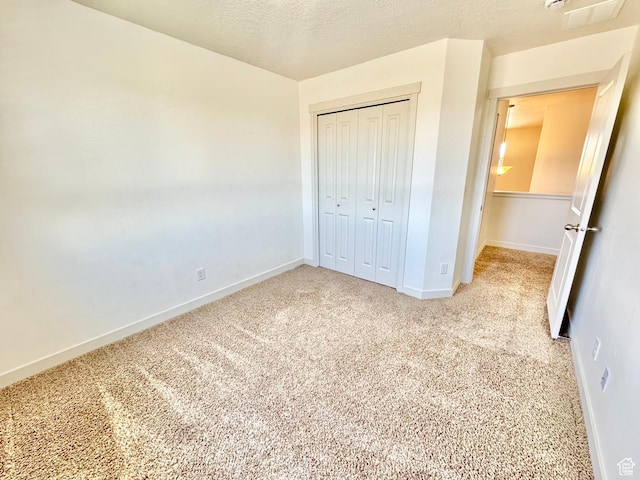5923 W 8170 S Unit U102, West Jordan, UT 84081 - unfurnished bedroom featuring carpet and a closet