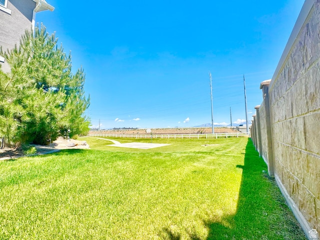 5923 W 8170 S Unit U102, West Jordan, UT 84081 - view of green lawn with a rural view
